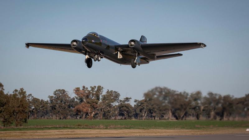The No. 100 Squadron English Electric Canberra bomber TT heritage aircraft takes off on its maiden flight following restoration at the Temora Aviation Museum.