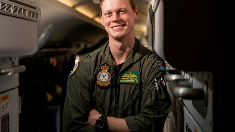 Flying Officer Michael Clifton, a maritime patrol and response officer from No. 11 Squadron, on board a P-8A Poseidon aircraft at RAAF Base Townsville during Exercise Talisman Sabre 2021. Photo: Leading Aircraftwoman Emma Schwenke