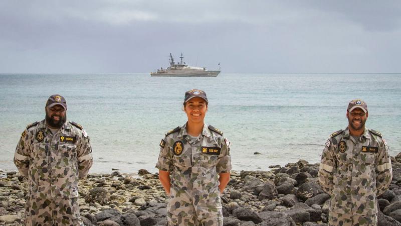 Able Seaman Henry Burns, left, Leading Seaman Monifah See Kee and Able Seaman Terry Waia at a Coming of the Light ceremony in the Torres Straits Islands. Photo: Leading Seaman Breanna Jacobs-Rochford