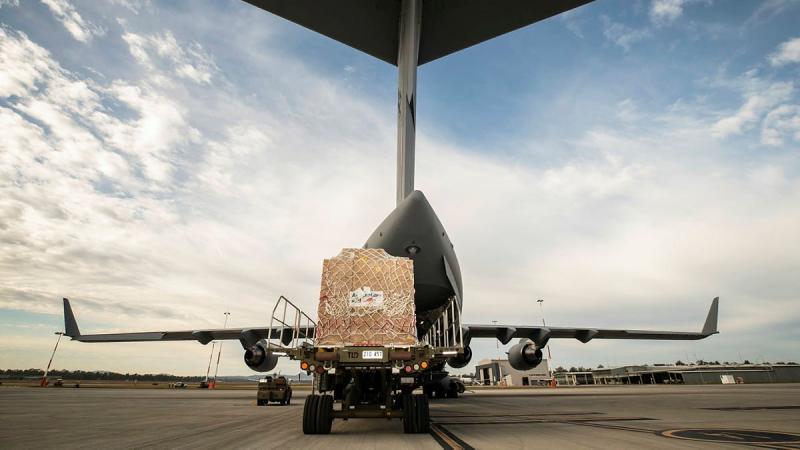 Humanitarian aid equipment is loaded into a No. 36 Squadron C-17A Globemaster III aircraft bound for Fiji. Photo: Sergeant Ben Dempster
