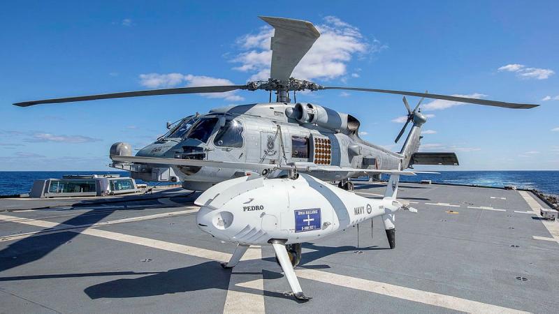HMAS Ballarat’s embarked MH-60R and S-100 Schiebel Camcopter on the flight deck during Exercise Talisman Sabre. Photo: Leading Seaman Ernesto Sanchez