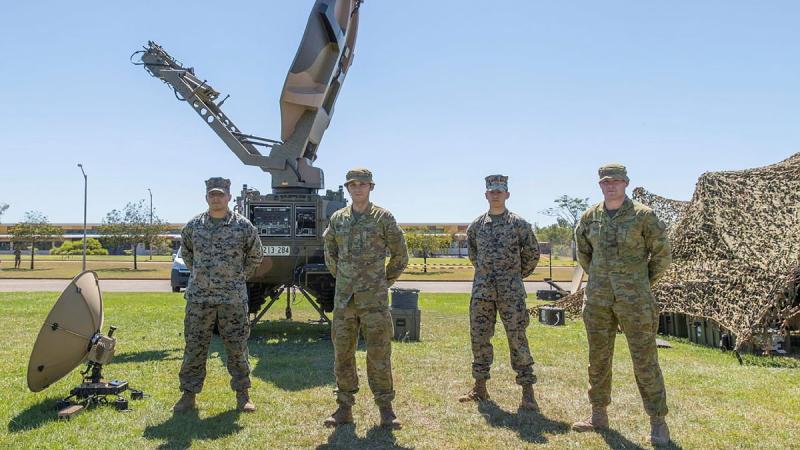 US Marine Corps Lance Corporal Rodrigo Morales, left, Australian Army Signaller Richard Davis, US Marine Corps Lance Corporal Johnny Hernandez and Australian Army Signaller Kurt Bloomfield at Robertson Barracks. Photo: Corporal Rodrigo Villablanca  