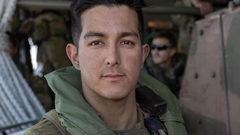 Private Louii Hornibrook, from the 3rd Battalion, Royal Australian Regiment, on board a landing craft during Exercise Talisman Sabre 2021. Photo: Leading Aircraftwoman Jacqueline Forrester