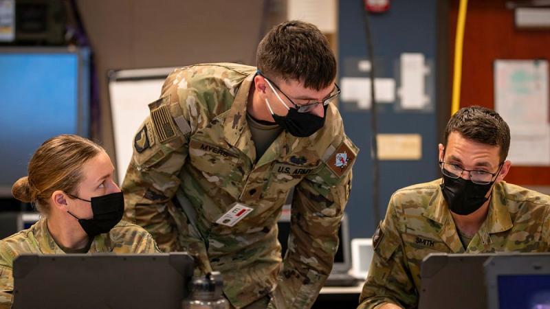 Australian Army Captain Sam Smith, Specialist Tyler Myers, of the US Army, and Private Brook Restall, from 7 Brigade, while deployed on the Joint Warfighting Assessment at Fort Carson, Colorado. Photo: Corporal Nicole Dorrett