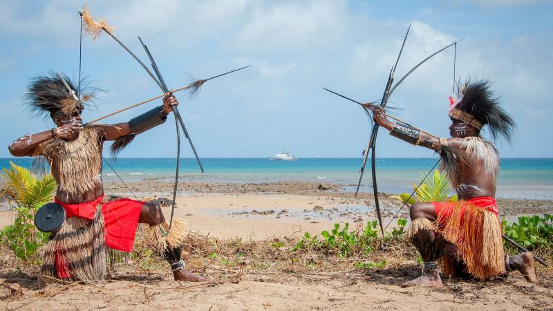 Leading Seaman Breanna Jacobs-Rochford photographed Sarpeye Warriors Privates Leo Akriba, left, and Jerry Anau from the 51st Battalion, Far North Queensland Regiment, during the Coming of the Light festival on Darnley Island in the Torres Strait.