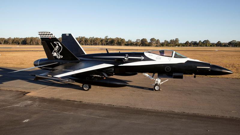 No. 75 Squadron F/A-18A Hornet A21-018 sports a bold black-and-white commemorative livery ahead of the squadron's transition to the F-35A Lightning II in 2022. Photo: Sergeant Ben Dempster