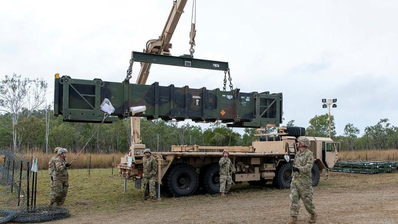 United States Army personnel load a Patriot missile on to a guided missile transporter vehicle in the lead-up to a live-fire event to be held at Shoalwater Bay in Queensland during Exercise Talisman Sabre. Photo: Private Jacob Joseph
