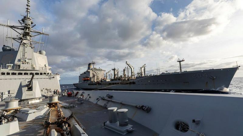 HMAS Brisbane conducts a replenishment at sea with USNS Rappahannock off the coast of Queensland during Exercise Talisman Sabre 2021. Photo: Leading Seaman Daniel Goodman