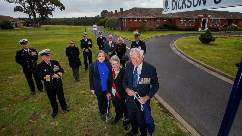 Commodore Jim Dickson (retd) unveils the sign for the new road named in his honour at HMAS Cerberus, joined by members of his family and senior Cerberus personnel. Photo: Petty Officer James Whittle