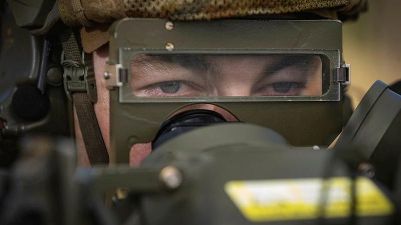 Gunner Nathan Wood, of the 16th Regiment, Royal Australian Artillery, observes a target during the RBS 70 man-portable air defence missile system training serial at the Shoalwater Bay Training Area. Photo: Corporal Madhur Chitnis