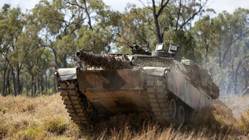 An Australian Army M1A1 Abrams tank from the 2nd Cavalry Regiment moves forward in a simulated attack serial held at the Townsville Field Training Area as part of Exercise Talisman Sabre. Photo: Corporal Brandon Grey