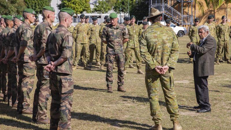 Uncle Desmond Sandy talks to French soldiers and members of 6 RAR during a Welcome to Country ceremony. Photo: Corporal Nicole Dorrit