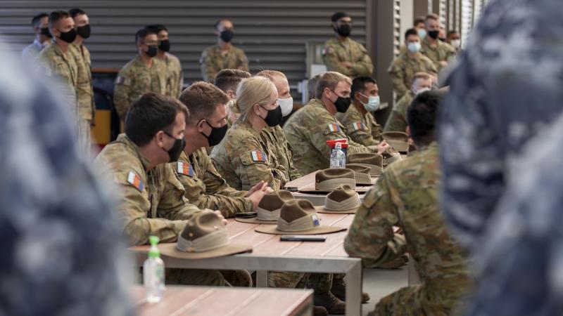 Members of the 7th Combat Brigade at Gallipoli Barracks, Brisbane, with other personnel, listen to Brigadier Jason Blain as they prepare to deploy on Operation COVID-19 Assist. Photo: Corporal Nicole Dorrett