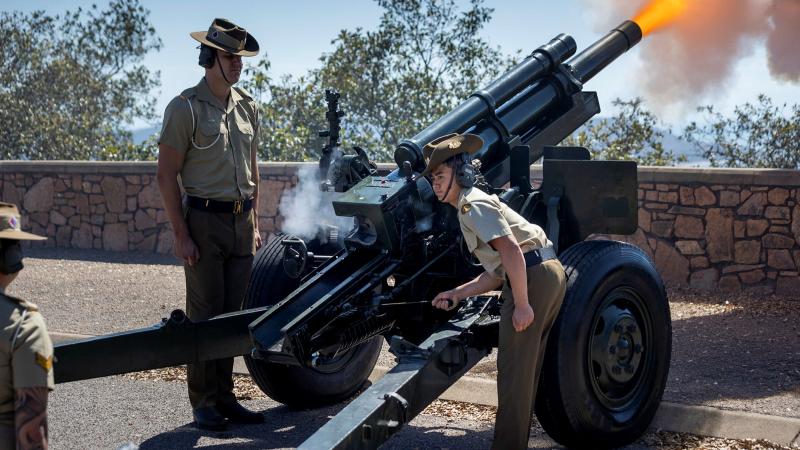 Gunners from the 4th Regiment, Royal Australian Artillery, fire a M2A2 105mm Howitzer during the Royal Australian Artillery's 150th birthday celebration at Townsville on August 1. Photo: Corporal Brandon Grey