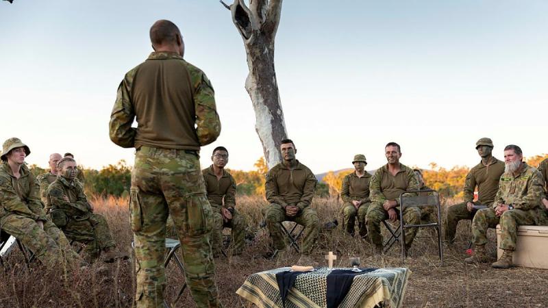Chaplain Gary Pope,  of the 3rd Brigade Headquarters, delivers a field service to soldiers during Exercise Talisman Sabre at Townsville Field Training Area, Queensland. Photo: Corporal Brendon Grey
