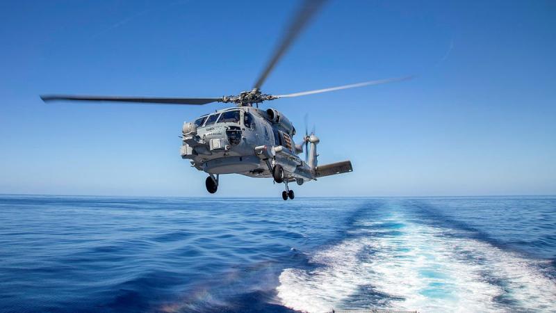 HMAS Ballarat's MH-60R, Convict, launches from the flight deck during Exercise Talisman Sabre. Photo: Leading Seaman Ernesto Sanchez
