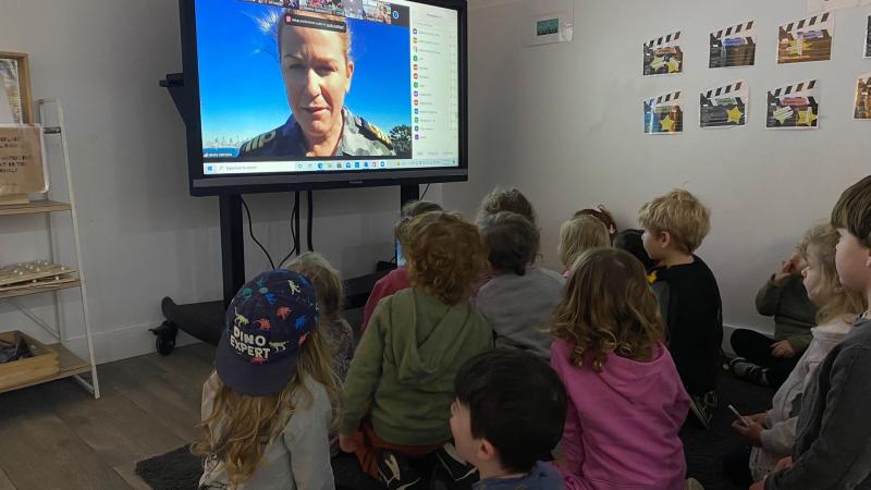 Executive Officer HMAS Watson Commander Tina Brown talks to children from 15 Active Kids Group childcare centres via Zoom during Kids Safety Week. Photo: Emma Wholihan, Active Kids Group