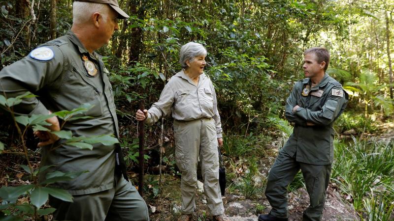 Historian Lynette Silver visits the jungle training area of Air Force’s  Combat Survival Training School with instructor Warrant Officer Shane Grist, left, and Commanding Officer Squadron Leader Simon Longley. Photo: Corporal Veronica O’Hara