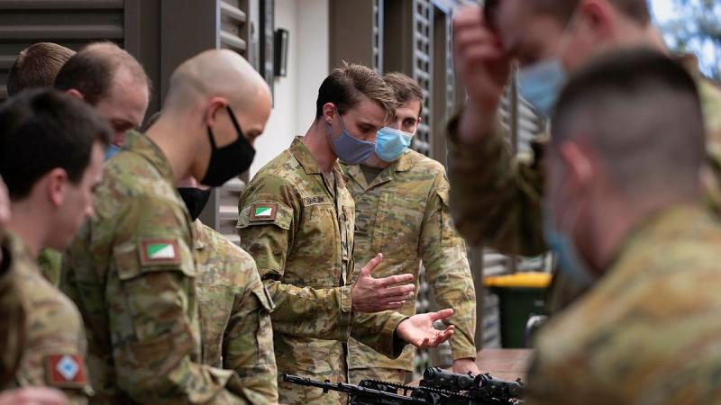 Corporal Thomas Hamelink, of 2nd/14th Light Horse Regiment (Queensland Mounted Infantry), explains the bullet expenditure system his group developed during an innovation sprint activity at Gallipoli Barracks, Brisbane. Photo: Corporal Nicole Dorrett