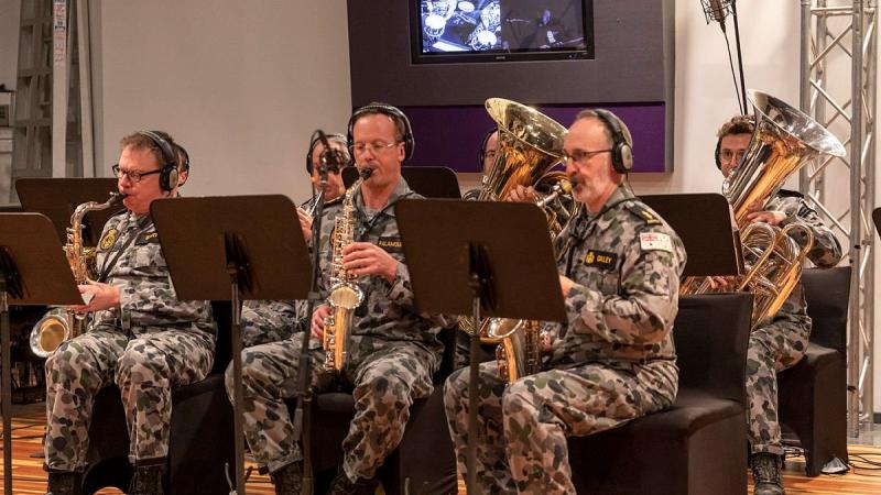 The Royal Australian Navy Band Melbourne brass section with the percussion section during the recording of a new selection of music at Oaklands Studios in Melbourne. Photo: Leading Seaman James McDougall 