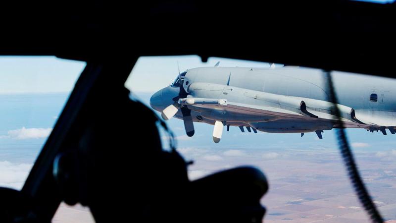 The view from the cockpit as No. 10 Squadron AP-3C Orions fly in formation.