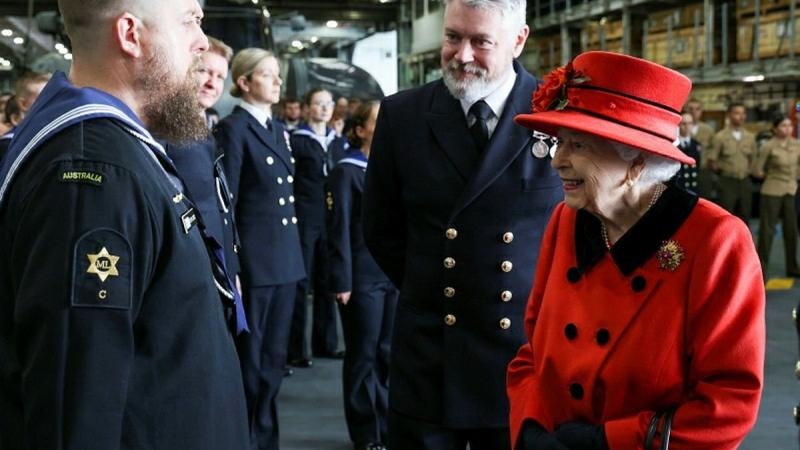 Leading Seaman Matt Jones, left, meets Her Majesty the Queen on board the Royal Navy’s flagship carrier, HMS Queen Elizabeth, as she farewells Carrier Strike Group 21 ahead of its Indo-Pacific deployment. Photo: Petty Officer Jay Allen