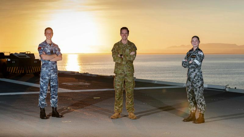 Army Captain Samuel O’Neal, centre, RAAF Flying Officer Kristian Henderson and RAN Leading Seaman Medic Erika Birkefeld on board HMAS Canberra during Exercise Talisman Sabre 2021. Photo: Leading Seaman Sittichai Sakonpoonpol
