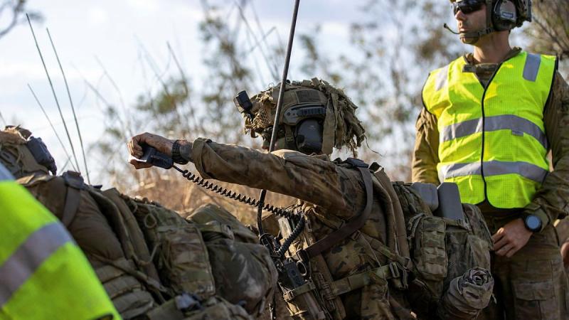 Gunner Jesse Thamm from the 8th/12th Regiment, Royal Australian Artillery, prepares to call for a danger-close fire mission at the Mount Bundey Training Area, Northern Territory. Photo: Corporal Rodrigo Villablanca