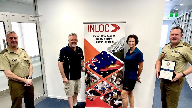 Major Jeff Martin, from No. 51 Far North Queensland Regiment, Paul Boag, Inloc CEO, Sergeant Kym Walker, of No. 51 FNQR and an Inloc employee, and Major Ben Lanskey, of Defence Reserve Support, at the award ceremony. Photo: Lieutenant Nic Hawkins
