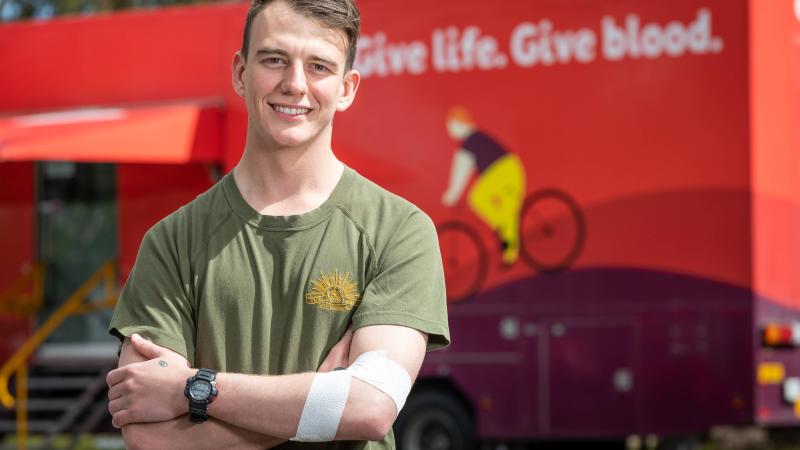 Private Joshua Salvini wears a bandage shortly after donating whole blood at the Lifeblood Mobile Donor Centre, RAAF Base Edinburgh, South Australia. Photo: Leading Aircraftman Sam Price