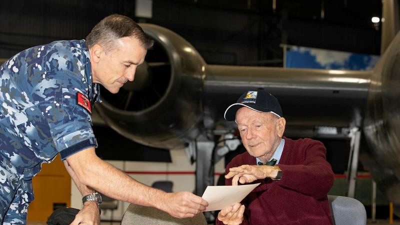 Bryan "Mick" McShane, right, shares some of his memories of the Air Force with Warrant Officer Russell Beck at the RAAF Base Amberley Aviation Heritage Centre. Photo: Corporal Jesse Kane