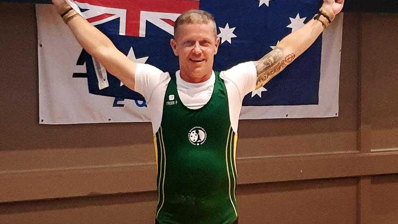 Champion weightlifter Sergeant Steven Graham celebrates his best result.