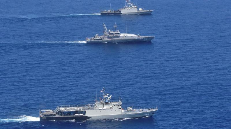 Indonesian Navy vessel KRI Sura, top, HMAS Ararat and KRI Kerapu conduct a coordinated maritime security patrol as part of Ausindo Corpat 2021.