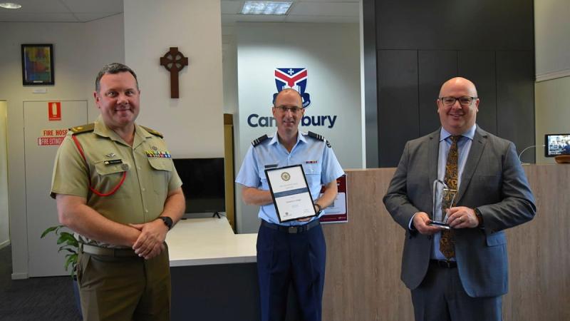 Major Ben Lanskey from Defence Reserves Support, left, Canterbury College's Flight Lieutenant Greg Wacker and Canterbury College principal Daniel Walker at the presentation of the Queensland Employer Support Award 2021.