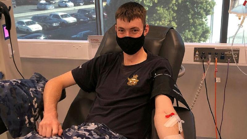 Plans officer with No. 382 Squadron Flight Lieutenant Trent Blinco making his 52nd blood donation at the Lifeblood Donor Centre in Ipswich as part of the 2021 Defence Blood Challenge.