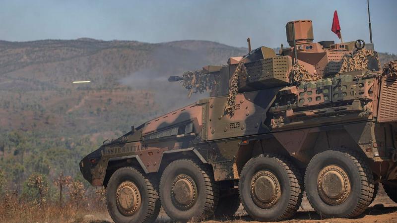 Soldiers from the 2nd/14th Light Horse Regiment (Queensland Mounted Infantry) conduct a live-fire training serial with a Boxer combat reconnaissance vehicle at Townsville. Photo: Corporal Nicole Dorrett