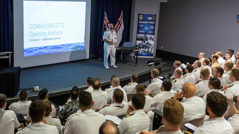 Commander Australian Mine Warfare and Clearance Diving Task Group, Commander Micheal Kerrisk, delivers the opening address to Australian and American personnel participating in Exercise Dugong 2021. Photo: Leading Seaman Ronnie Baltoft