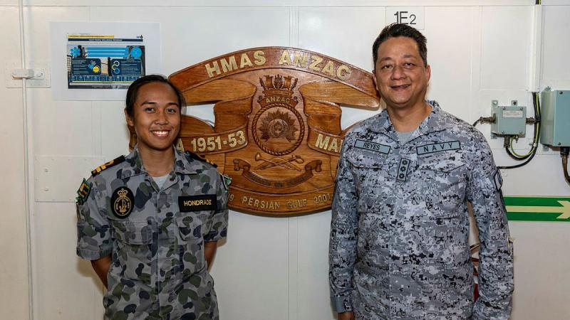 Philippine Navy Deputy Commander Indo-Pacific Endeavour Captain Constancio Reyes, right, with Lieutenant Maria Hondrade aboard HMAS Anzac during Indo-Pacific Endeavour 21. Photo: Leading Seaman Leo Baumgartner