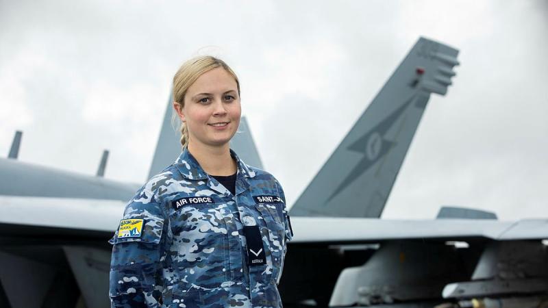 Leading Aircraftwoman Alexandra Saint-John, of No. 6 Squadron, with an EA-18G Growler aircraft on the flightline at Eielson Air Force Base in Alaska. Photo: Sergeant Rodney Welch