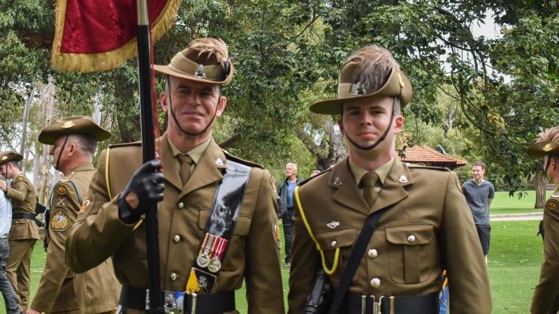Warrant Officer Class 2 Luke Woolfe, left, and his son Trooper James Woolfe.