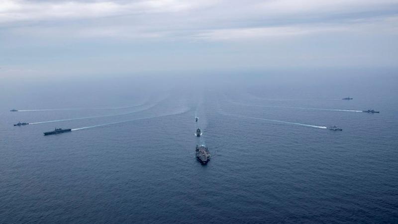 USS Carl Vinson, JS Kaga, HMAS Sirius, INS Satpura, USS Lake Champlain, INS Ranvijay, JS Murasame, USS Stockdale and HMAS Ballarat break from a formation sail during Exercise Malabar. Photo: Leading Seaman Ernesto Sanchez