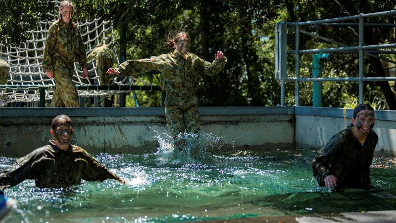 Students from St Rita’s College, Brisbane, participate in a team-building exercise on the Gallipoli Barracks obstacle course during a leadership camp run facilitated by the 9th Battalion, Royal Queensland Regiment. Photo: Private Jacob Hilton
