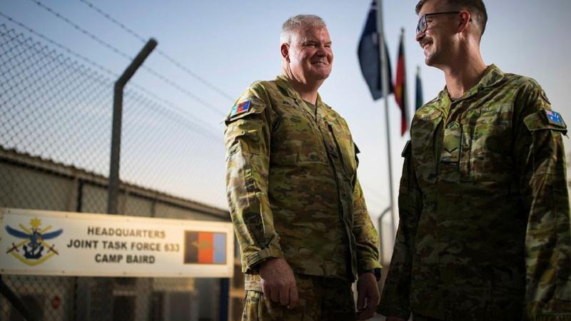 Major Brett Pates, left, and his son, Lance Corporal Timothy Pates, are both deployed to the Middle East region on Operation Accordion. Photo: Sergeant Glen McCarthy