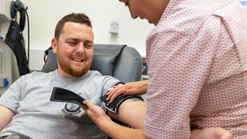 Leading Seaman Benjamin Jenkins, of HMAS Stirling, prepares to make a blood donation at the Rockingham Red Cross Lifeblood Centre, Western Australia. Photo: Leading Seaman Ronnie Baltoft