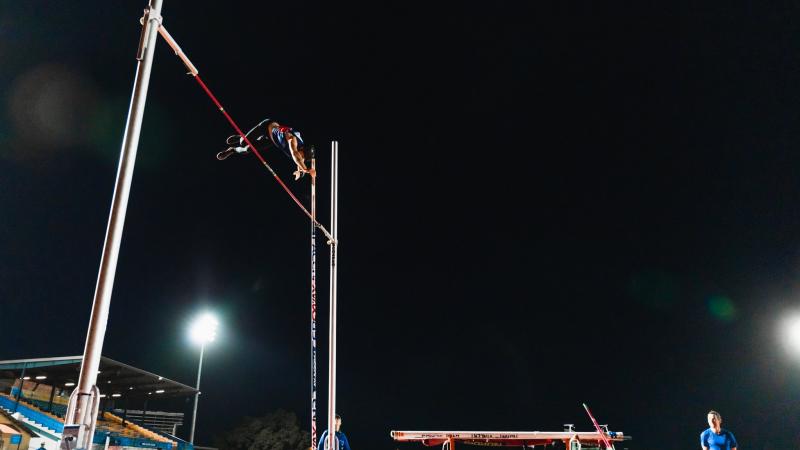 Corporal Brodie Cross clears the bar in the open men's pole vault at the Athletics NQ Championships in Townsville.