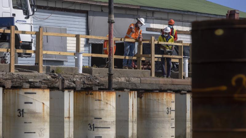 Australians and Fijians work together on the new Stanley Brown Wharf extension in Suva. Photo: Corporal Sagi Biderman