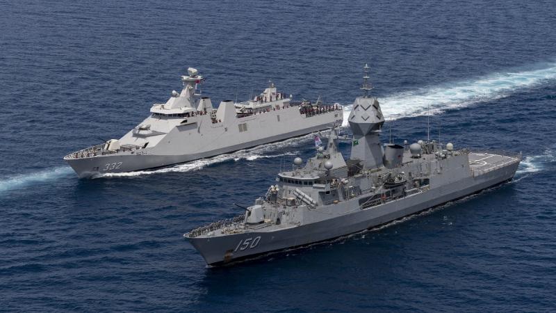 Indonesian navy ship KRI Gusti Ngurah Rai and HMAS Anzac sail in company during Exercise New Horizon. Photo: Leading Seaman Leo Baumgartner