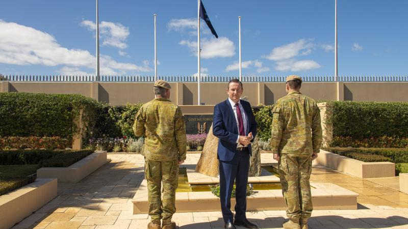 WA Premier Mark McGowan turns after laying a wreath at 'The Rock' memorial inside Campbell Barracks.