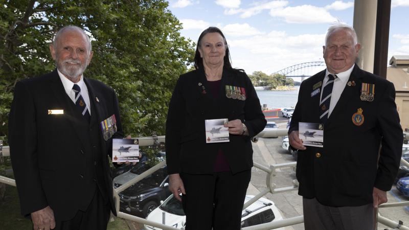 Naval Association of Australia National President David Manolas, Vice President Lorraine Grey and NSW Section President Keith Grimley hold 'Once Navy, Always Navy' commemorative compact discs featuring the new recording.