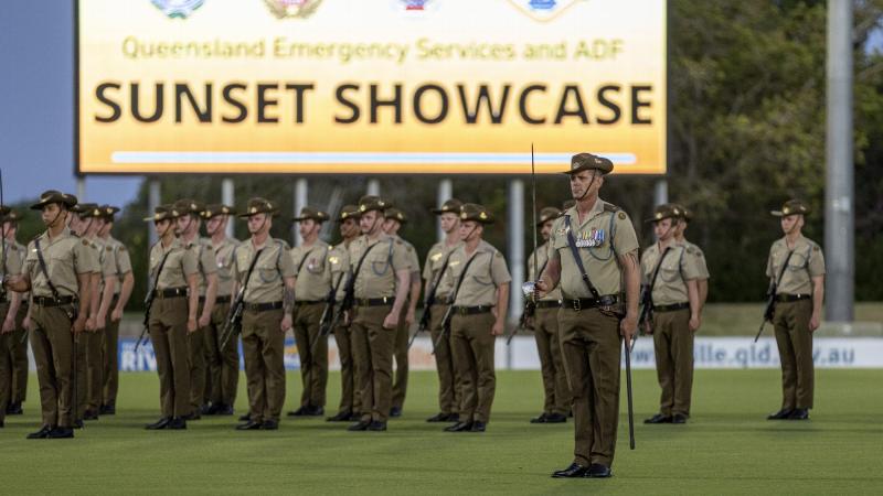 Soldiers and officers from the 1st Battalion, The Royal Australian Regiment on parade during the Queensland Emergency Services and ADF Sunset Showcase at Riverway Stadium, Townsville. Photo: Corporal Brandon Grey